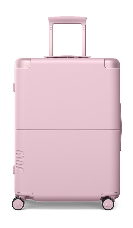 Checked Luggage in Pink.