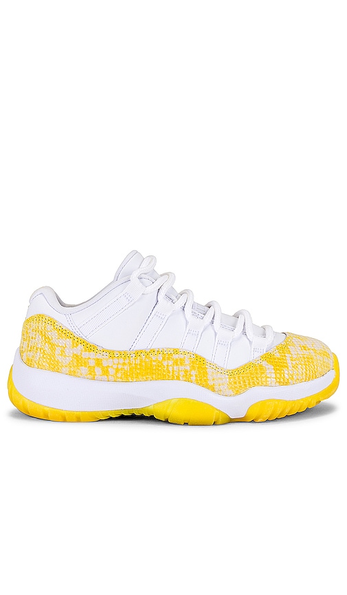 Jordan Air Jordan 11 Retro Low Sneaker in White, Tour Yellow