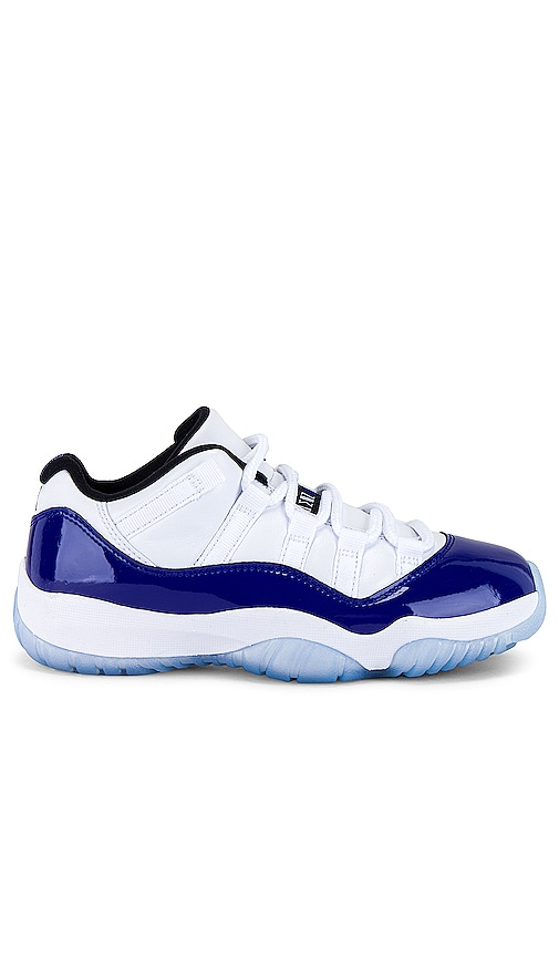 Jordan Air Jordan 11 Retro Low Sneaker in White Black Concord REVOLVE