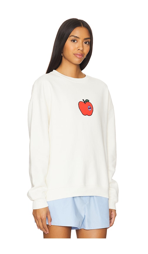 Shop Kule The Oversized Big Apple Sweatshirt In 크림