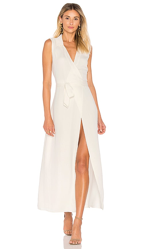 L'academie L'Academie The Sleeveless Wrap Dress in Ivory. 