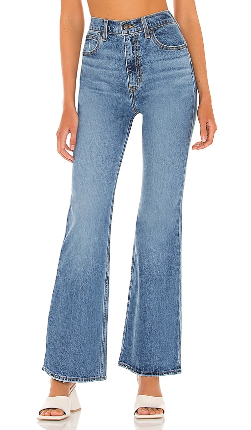 70s High Rise Flare Jean in . Size 27 also in 31, 32 Revolve Damen Kleidung Hosen & Jeans Jeans High Waisted Jeans Blue 