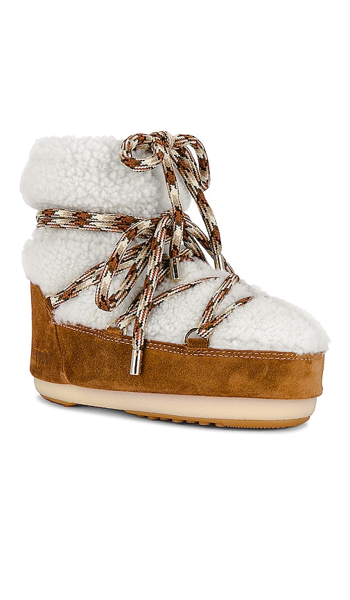 Shop Moon Boot Low Shearling Boot In Whiskey & Off White