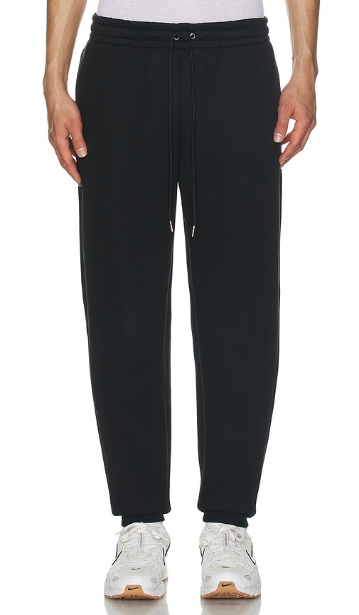 Shop Nike Reimagined Fleece Pants. - In Black