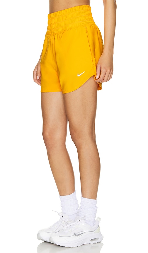 Shop Nike One Dri-fit Ultra High Waisted Short In Sundial & Reflective Silver