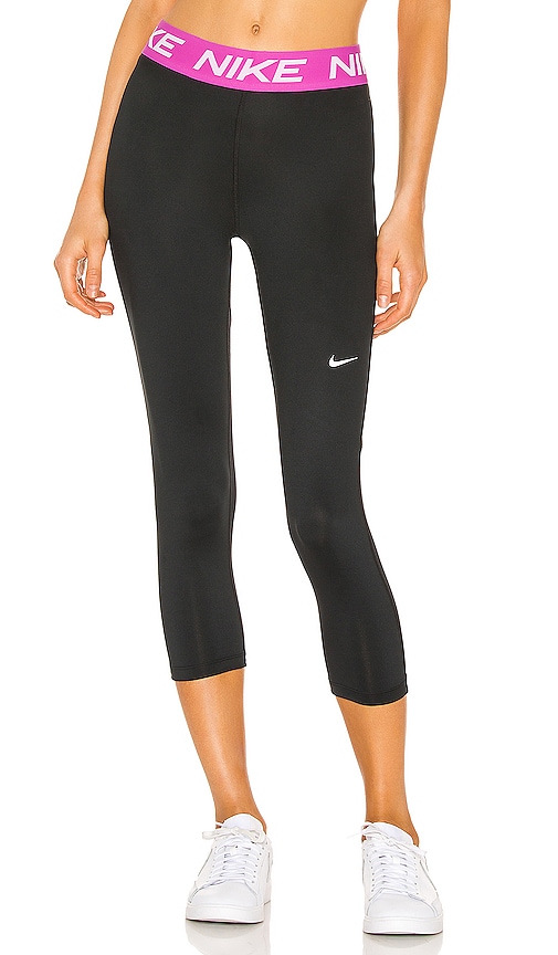 Nike Victory Baselayer Capri Essential Legging in Black & Pink | REVOLVE
