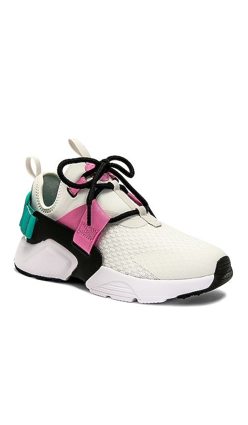 nike air huarache city low pink