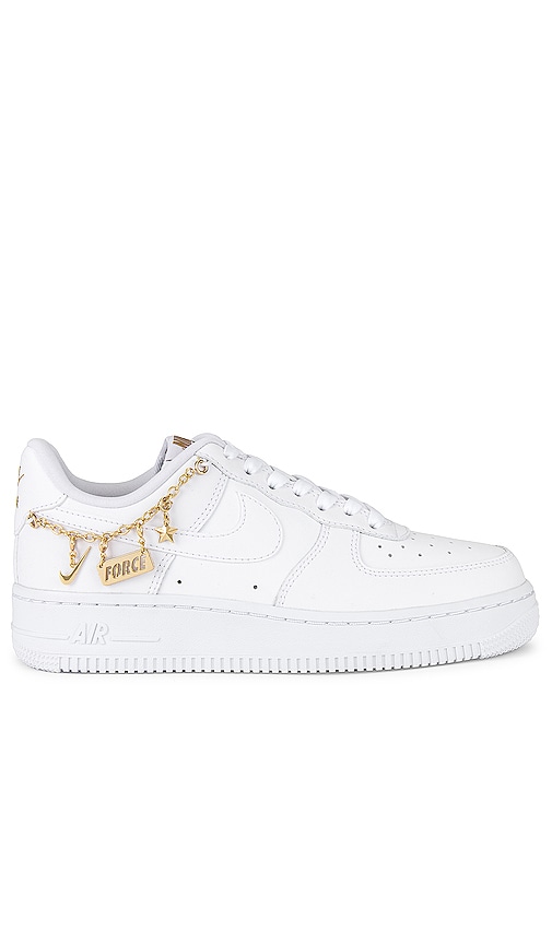 white nike with gold