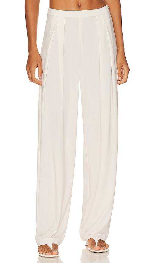 Shop Norma Kamali Tapered Pleated Trouser In Cream