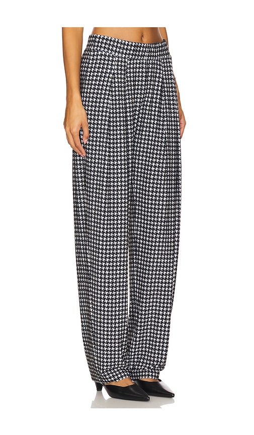 Shop Norma Kamali Low Rise Pleated Trouser In Black