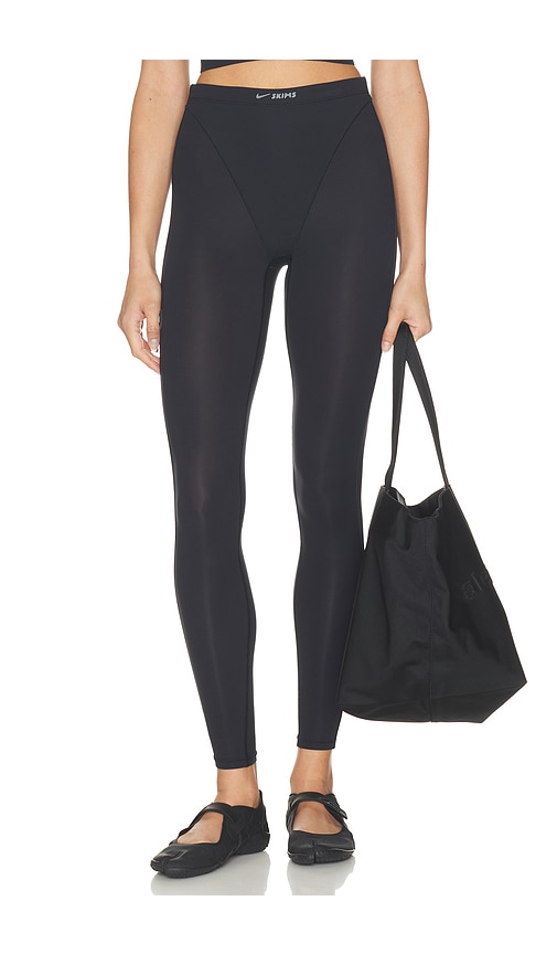 NikeSKIMS COLLANTS WEIGHTLESS  en Black. Taille L. Also en XXS, XS, S, M, XL.