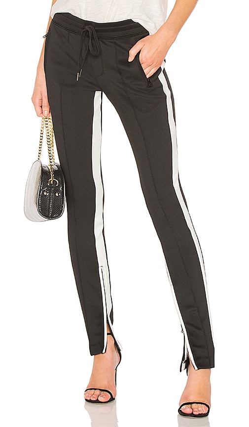 Pam & Gela Low Rise Cigarette Sweatpant in Black | REVOLVE