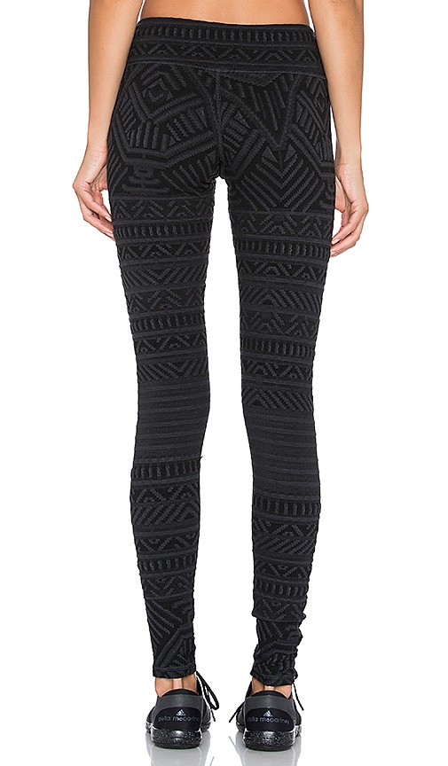 Pink Lotus Activate Legging in Charcoal | REVOLVE