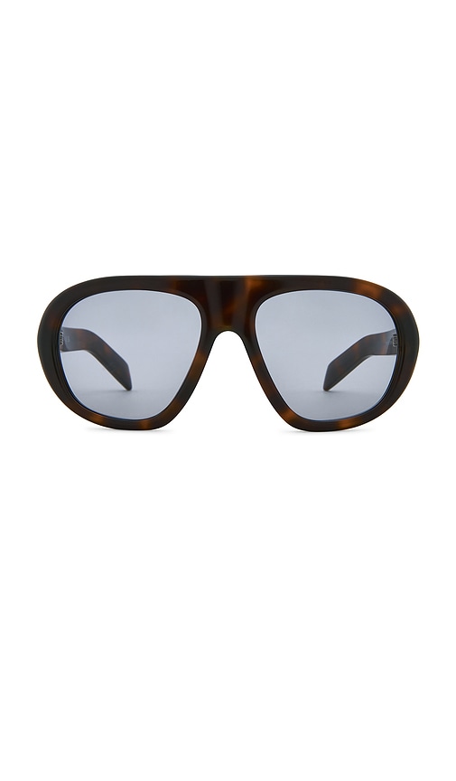 Prada Circular Sunglasses in Brown.