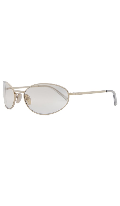 Shop Prada Oval Sunglasses In Metallic Gold