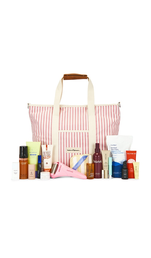 REVOLVE Beauty Summer Essentials Beauty Bag in Laurens Pink Stripe.