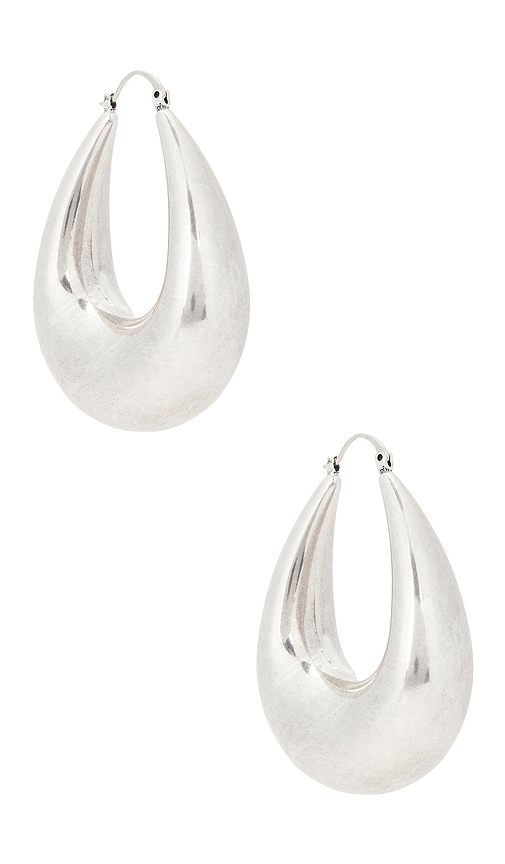 Julia Silver Hoop Earring in Metallic Silver.