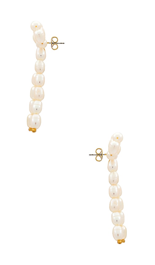 Shop Shashi Pearl Bow Earring In Ivory