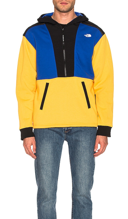 blue and yellow north face jacket