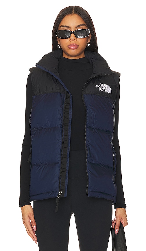 Product image of The North Face 1996 Retro Nuptse Vest in Summit Navy & Tnf Black. Click to view full details