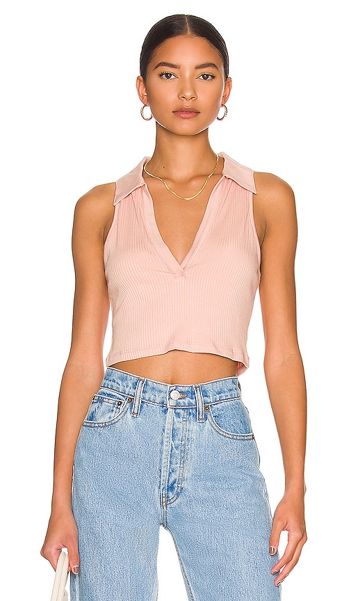Revolve Women Clothing Tops Tank Tops Sleeveless Cropped Polo in White. 