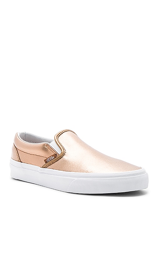 white and rose gold vans