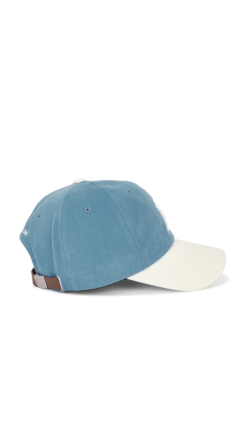  Verutum Initial Cap In Blue. 
