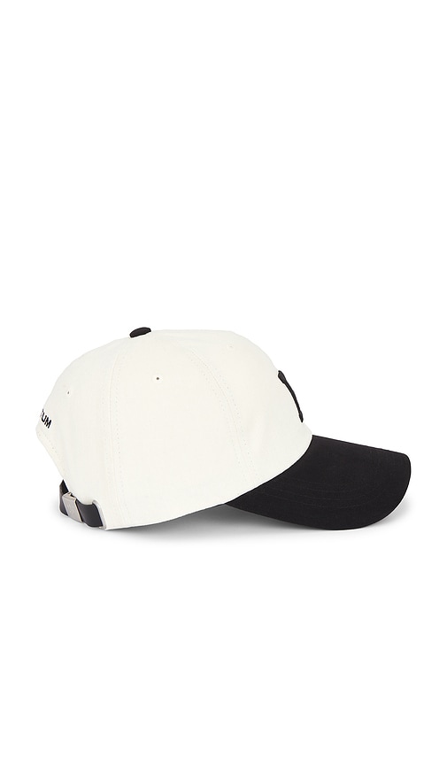  Verutum Initial Cap In Cream. 