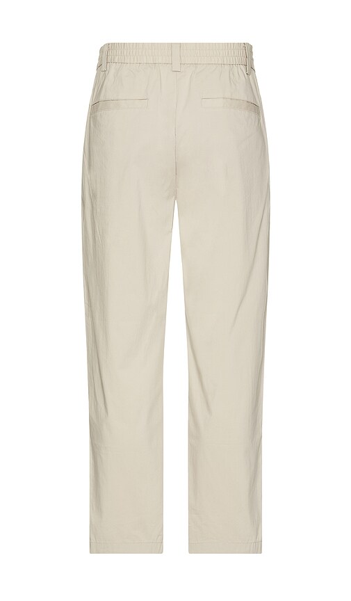Shop Wao Relaxed Nylon Pleated Pant In Cream