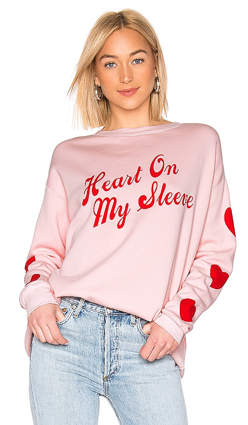 heart on sleeve sweatshirt