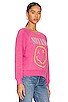 view 3 of 8 Nirvana Smiley Raglan Crew in Pink Cosmo