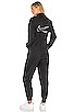 nsw swoosh utility jumpsuit