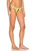 view 3 of 5 Emoji Reversible Side Tie Bikini Bottom in Yellow Daisy