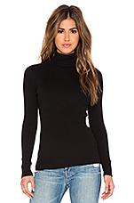 Product image of 525 Solid Rib Turtleneck Sweater. Click to view full details