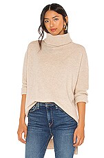 Product image of Alice + Olivia Sawyer Turtleneck Hi Lo Tunic Pullover. Click to view full details