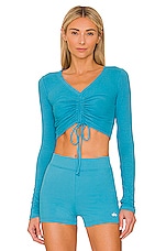 Product image of alo Ribbed Cropped Cinch Long Sleeve. Click to view full details