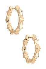 Product image of BaubleBar Mariam Huggie Hoops. Click to view full details