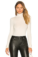 Product image of Enza Costa Long Sleeve Turtleneck. Click to view full details