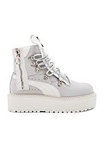 white puma boots