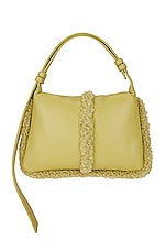 Product image of Simon Miller Mini Faux Shearling Puffin Bag. Click to view full details