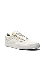 white and gold vans