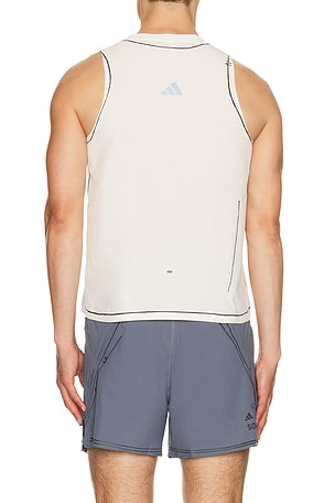 adidas by Song for the Mute Running Singlet in White. Size L. Also