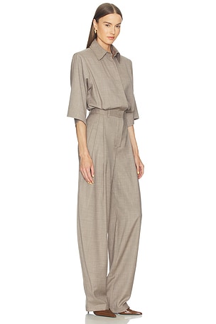 The Andamane Axel Padded Shoulder Jumpsuit in Beige