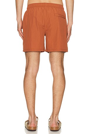 AUTO-REPLY 5.5 Solid Sebastian Swim Trunk in Brick. Size XL/1X. Also