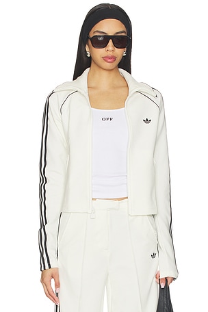 Adidas origeN/Als top deportivo firebird en color blanco