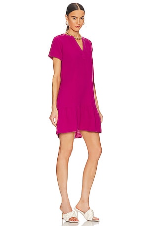 Bobi Split Neck Ruffle Hem Mini Dress in Fuchsia