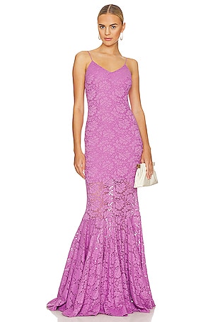 morgana purple dress This purple velvet gown with gold embroidery was almost certainly made for the television show . It was worn by Katie McGrath as Morgana numerous times throughout the show's 2009-2013
