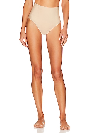 JIV ATHLETICS The Cameltoe Proof Mid Rise Thong in Sand
