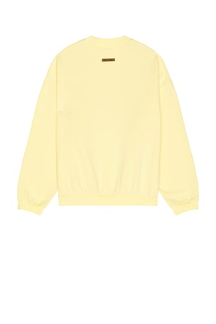 Fear of God ESSENTIALS 90's Fit Fleece Crew Neck Sweatshirt in Lemon