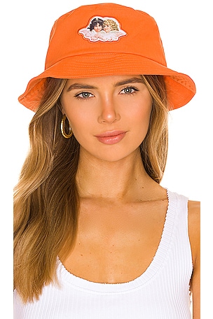 FIORUCCI Angel Patch Bucket Hat in Orange REVOLVE